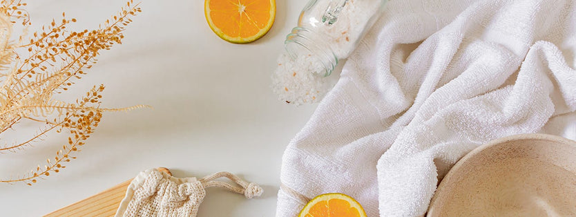 Bathroom bench with a towel and bath salts