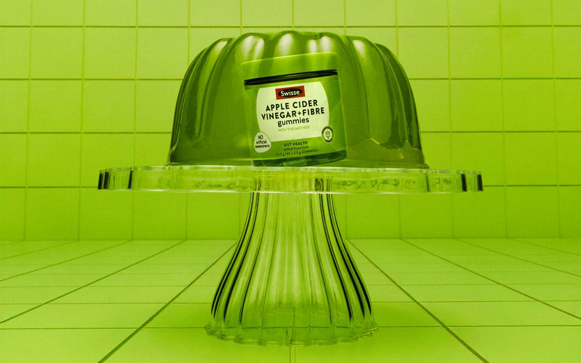 Swisse Apple Cider Vinegar + Fibre Gummies set in green jelly