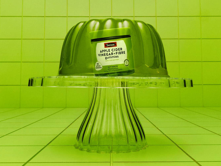 Swisse Apple Cider Vinegar + Fibre Gummies set in green jelly