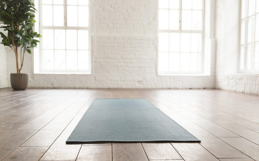 Yoga mat in empty yoga studio
