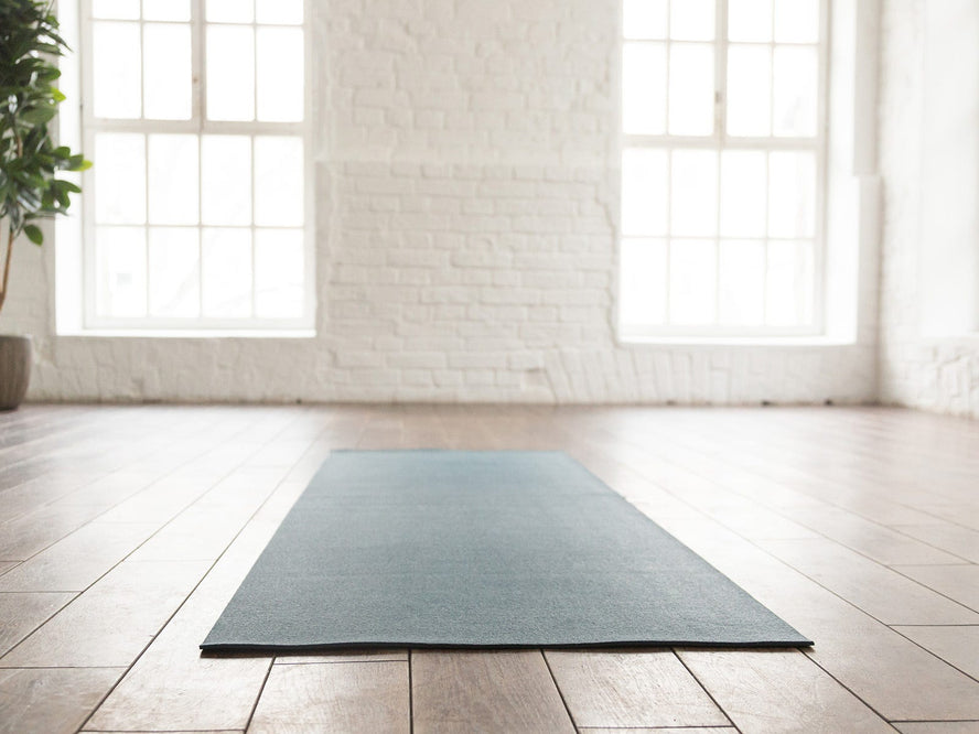 Yoga mat in empty yoga studio