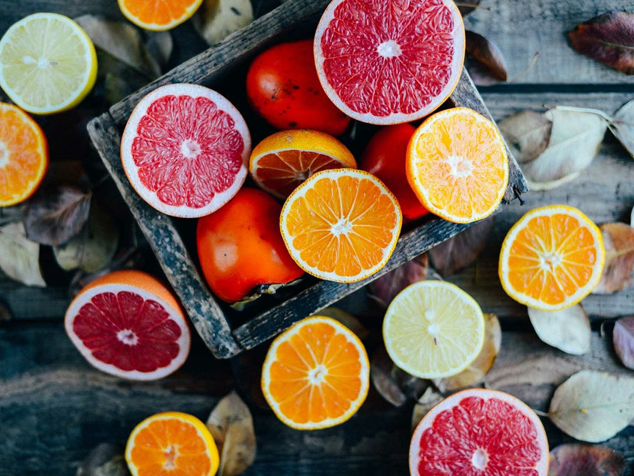 Sources of Vitamin C - citrus fruit sliced open