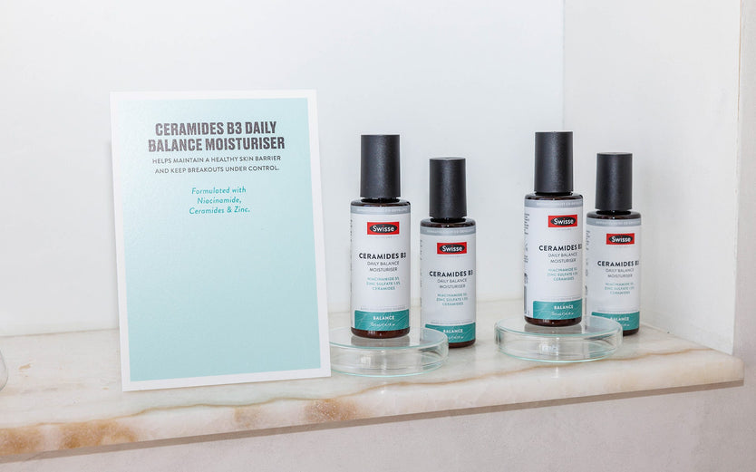 Swisse Ceramides B3 Daily Balance Moisturiser on a shelf in a bathroom