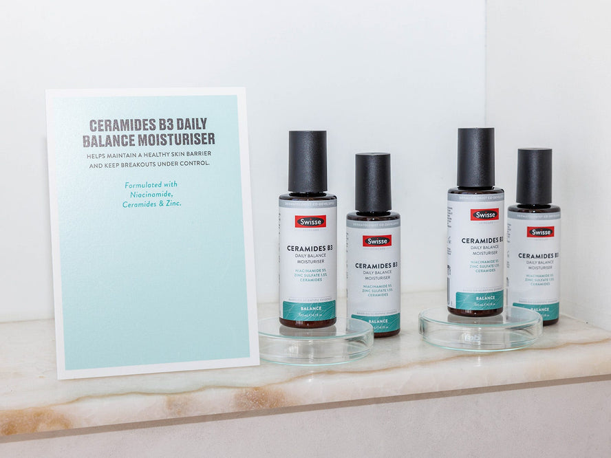 Swisse Ceramides B3 Daily Balance Moisturiser on a shelf in a bathroom