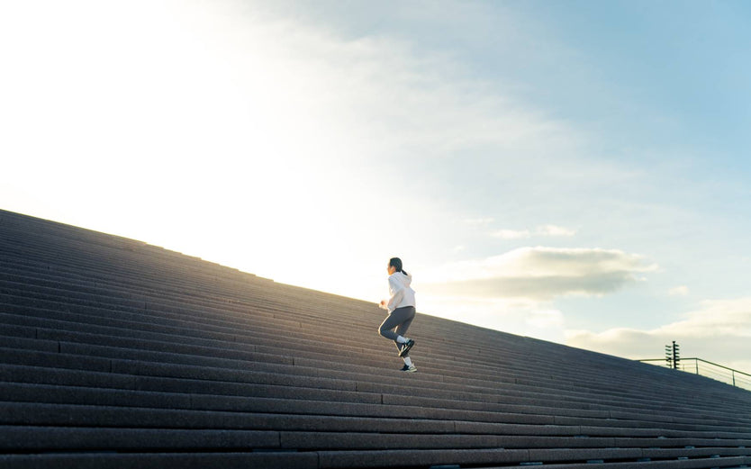 Person running up stairs
