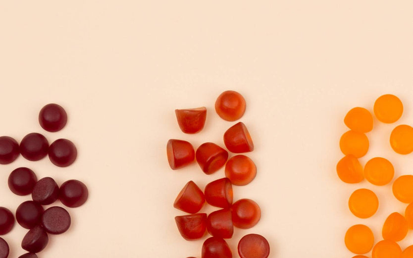 Colourful gummies spilled out on a table