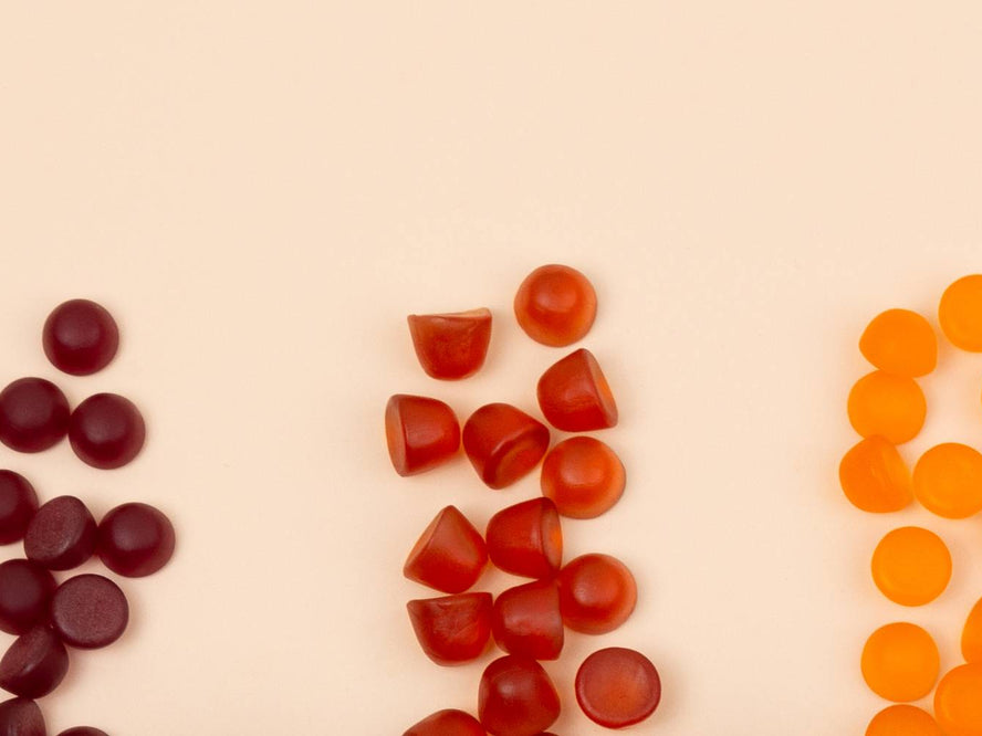 Colourful gummies spilled out on a table