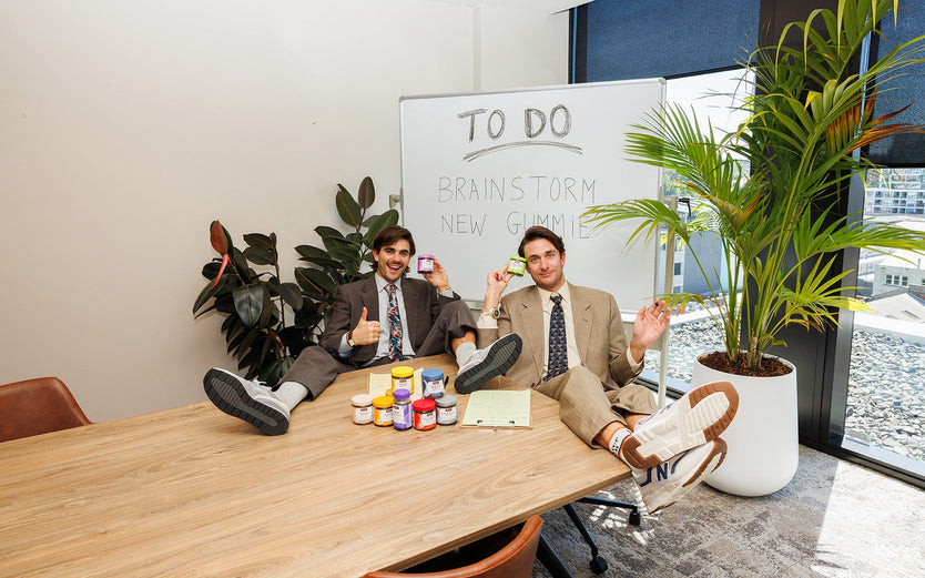 The Inspired Unemployed Sitting At A Boardroom Table With Swisse Gummies
