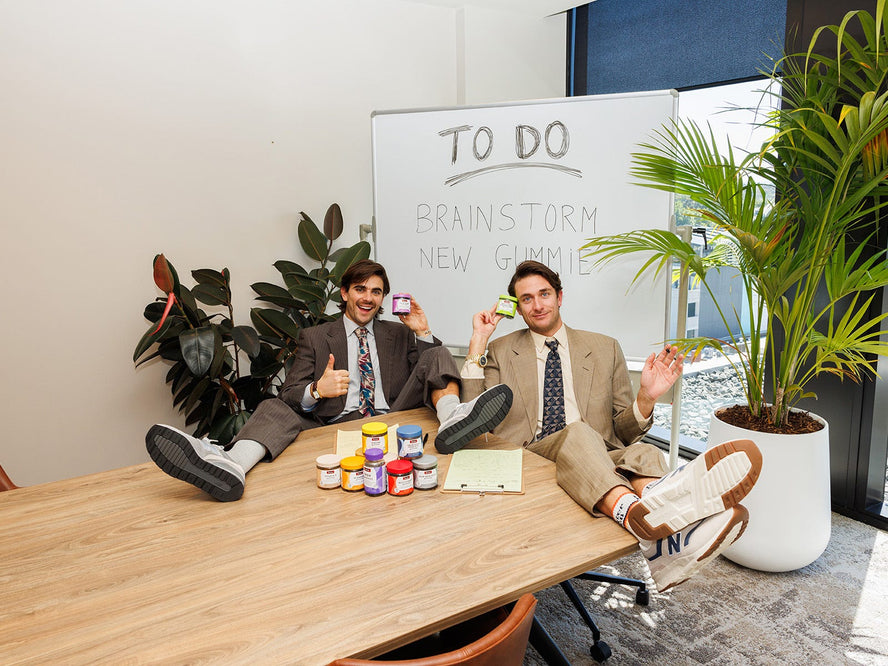 The Inspired Unemployed Sitting At A Boardroom Table With Swisse Gummies