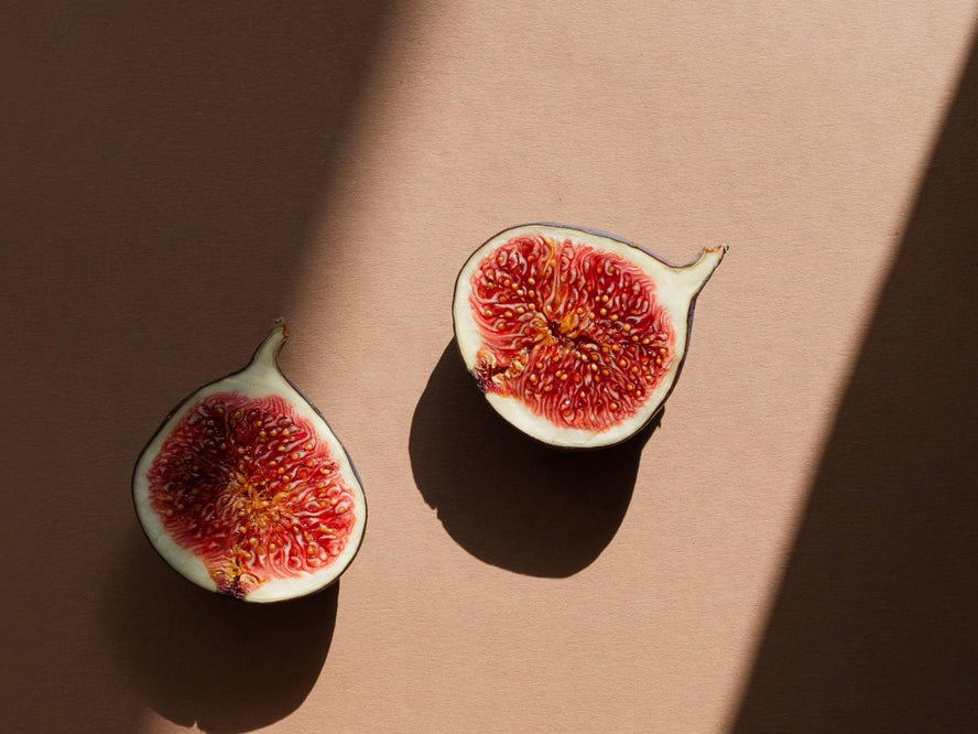 Fig cut in half on a table