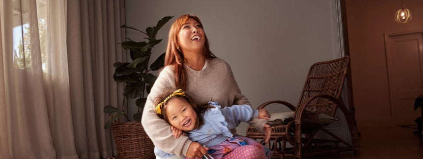 Women and child laughing