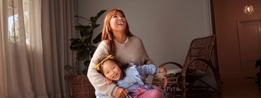 Women and child laughing