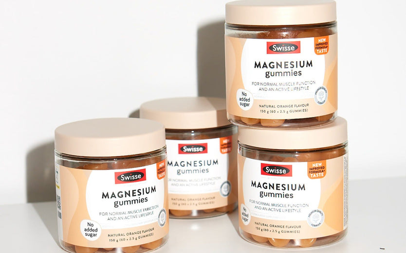 Stacked jars of Swisse Magnesium Gummies