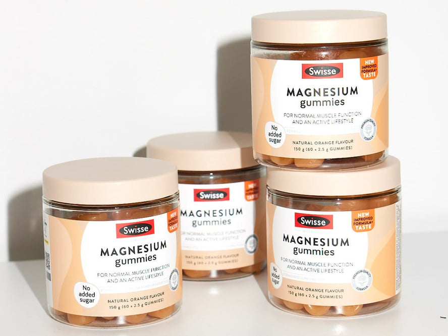 Stacked jars of Swisse Magnesium Gummies