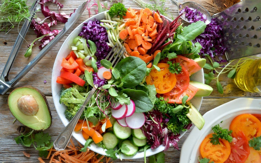 A birdseye view of a salad in a bowl on a table