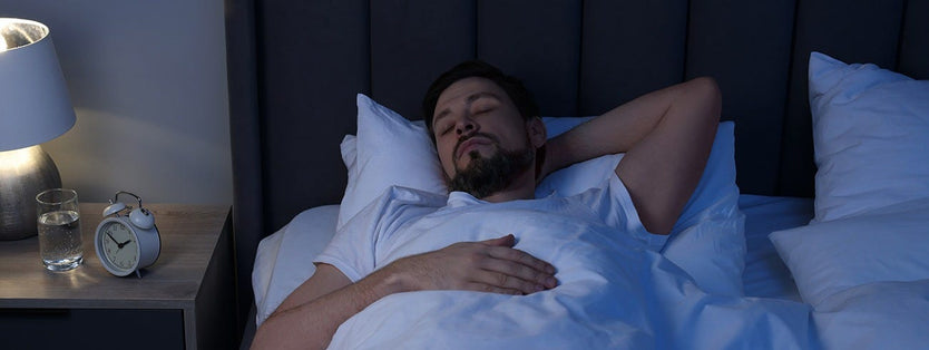 Person asleep in bed