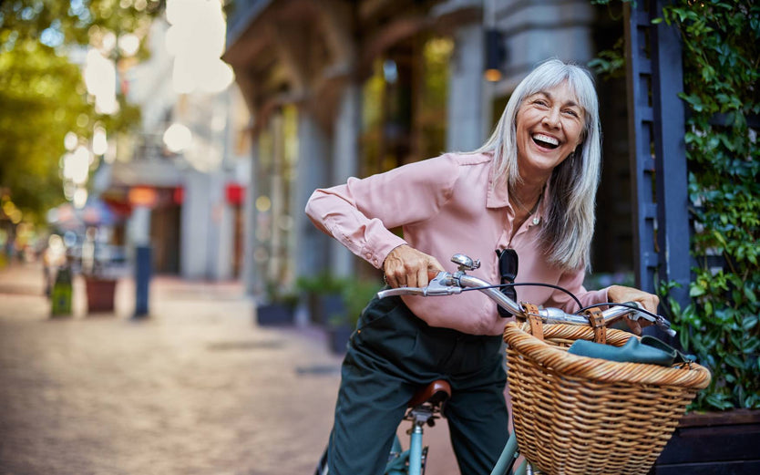 Older woman riding a bike
