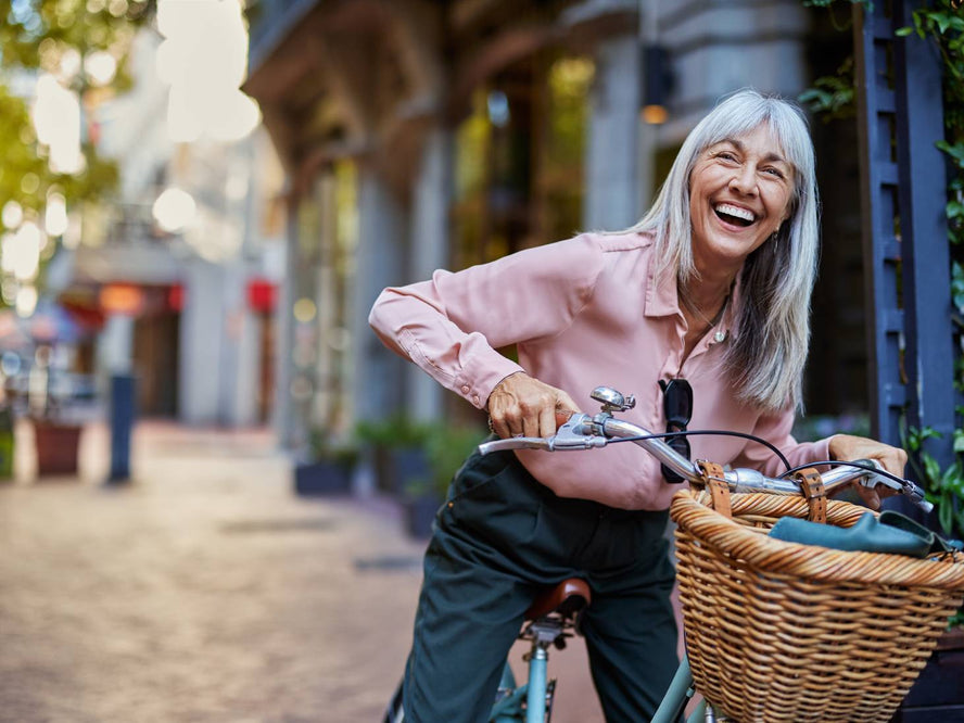Older woman riding a bike