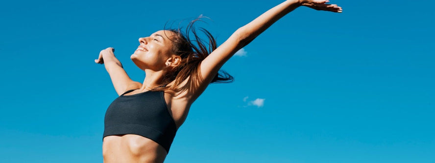Person stretching in the sunshine