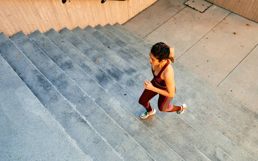 Person running up stairs