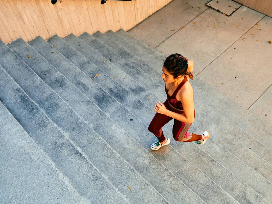 Person running up stairs