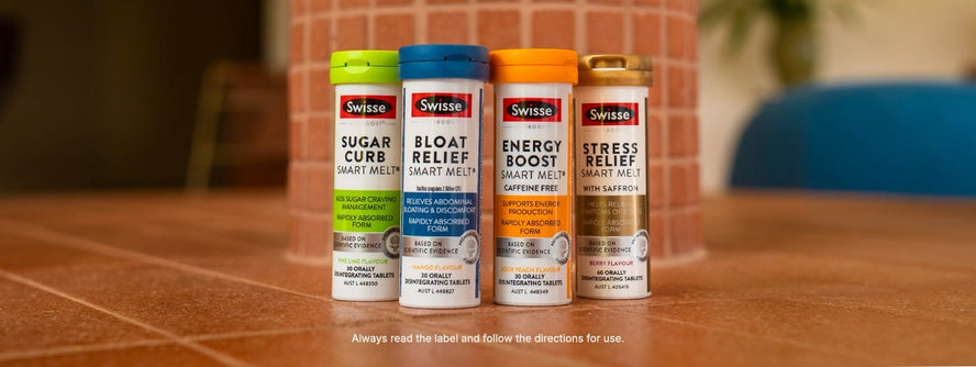Four vials of Swisse Smart Melts lined up on a bench