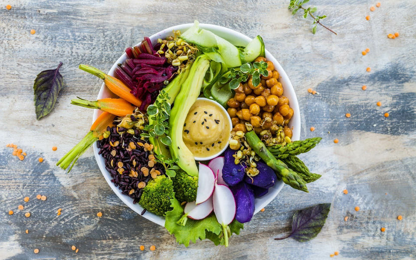 A healthy bowl full of chickpeas and vegetables