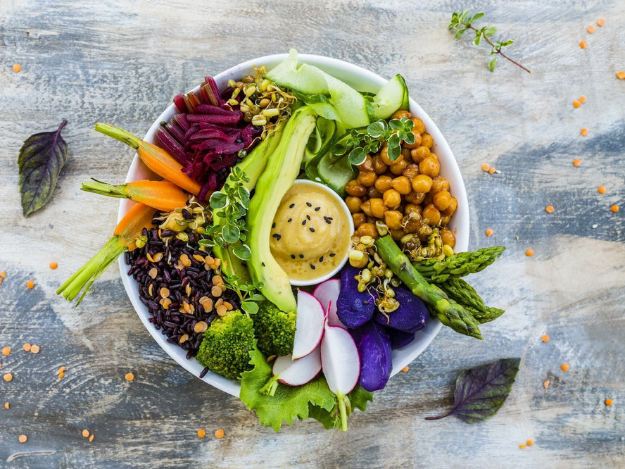 A healthy bowl full of chickpeas and vegetables