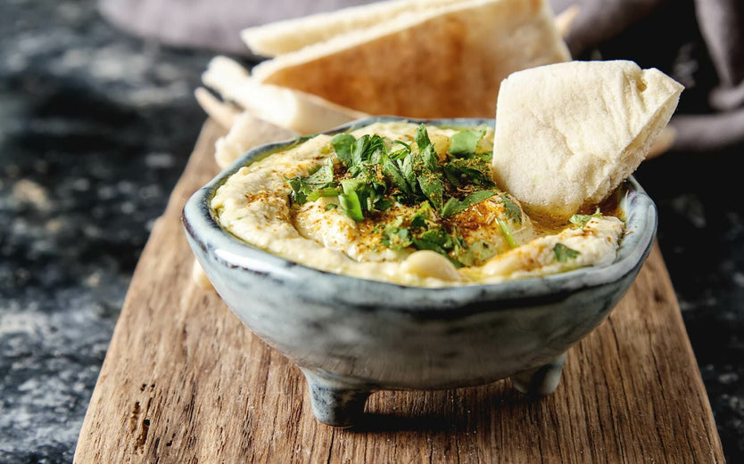 hummus in bowl with flatbread