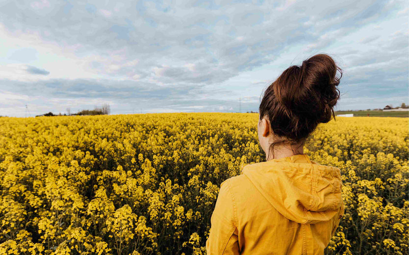 Woman in a field of flowers