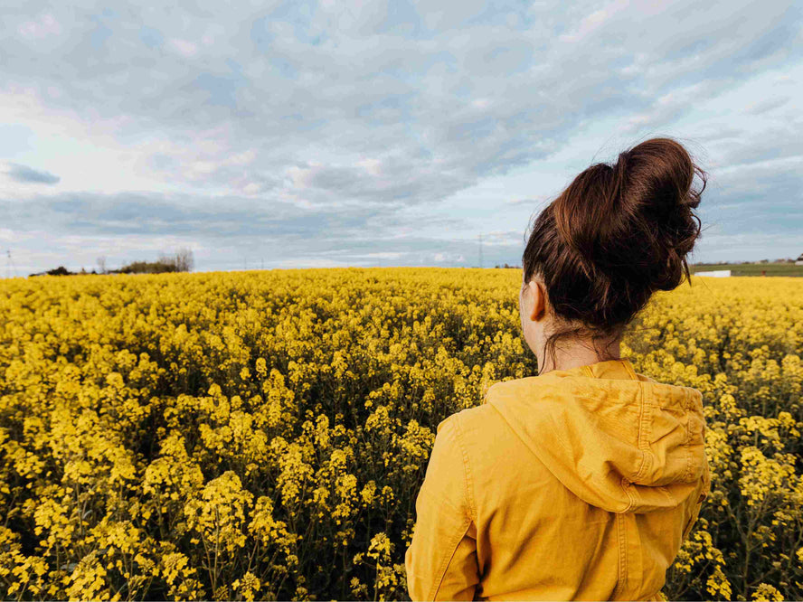 Woman in a field of flowers