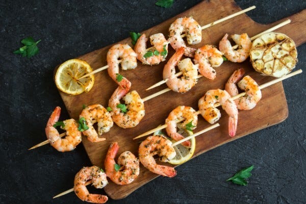 Prawn Skewers on a wooden board