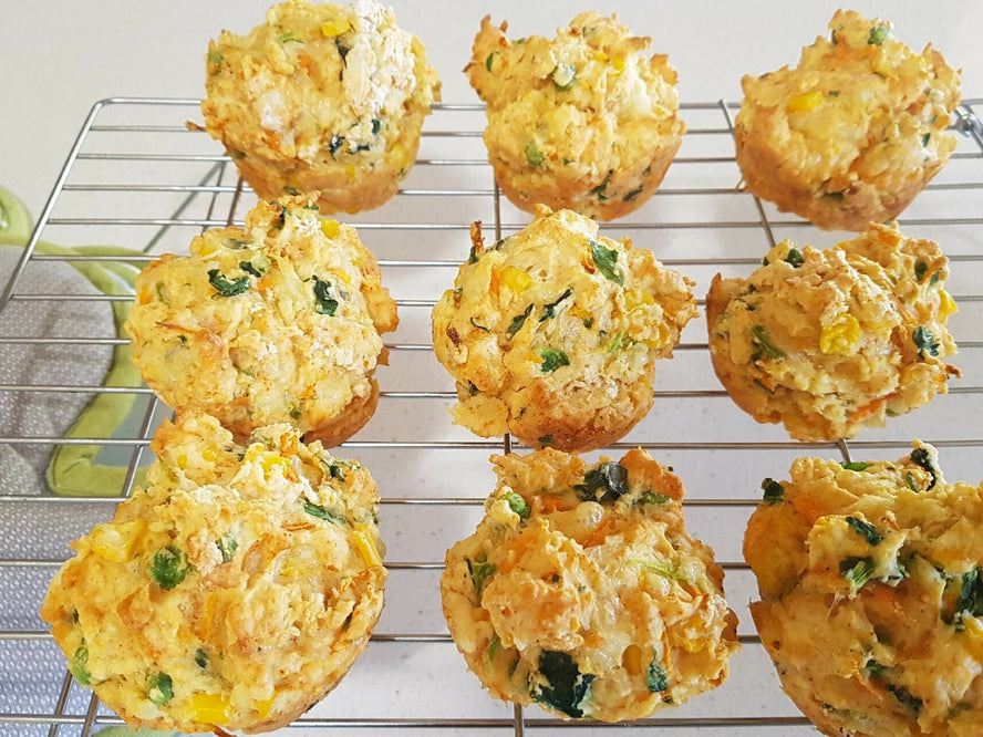 Healthy veggie muffins on a wire rack