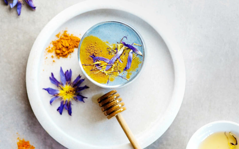 Drink with tumeric sprinkled on top