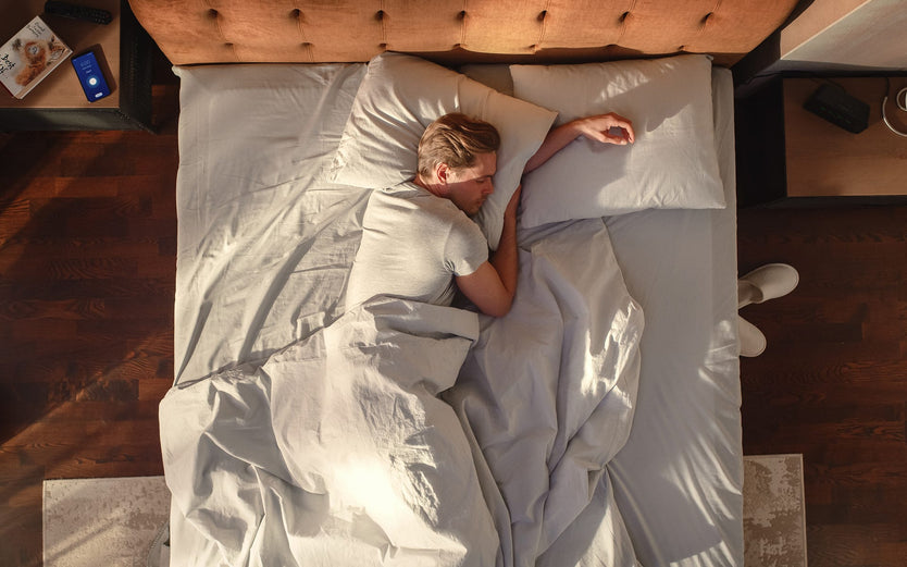 Man lying in bed asleep