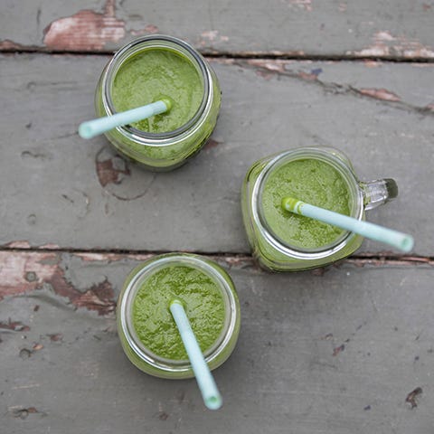 Green spirulina smoothies in glasses