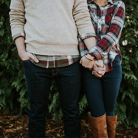 Couple holding hands