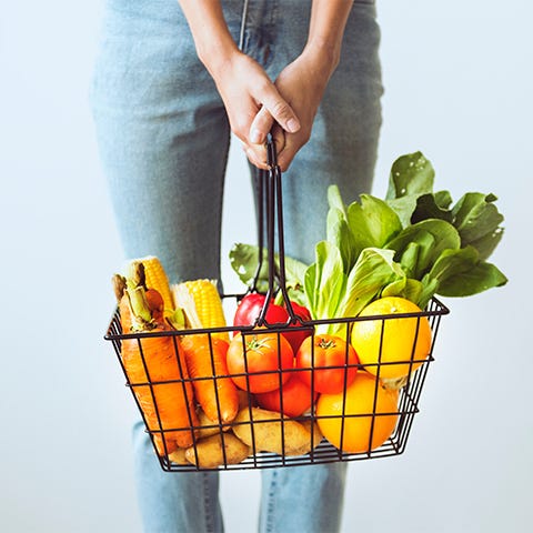 Fresh fruit in wire shopping basket