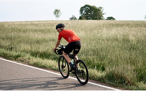 Man cycling on road